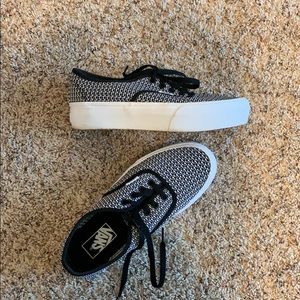 Vans. Black and white. Platform sole. Retro style.